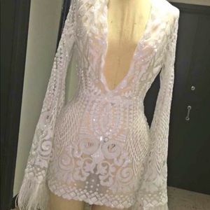 White Flare Feather Sleeve Dress.